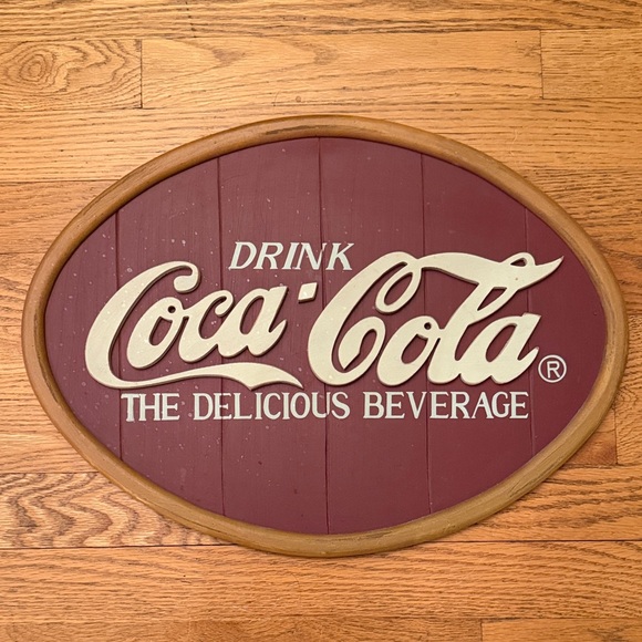 Coca Cola Other - Coca-Cola Oval Sign in Maroon and Cream Letters